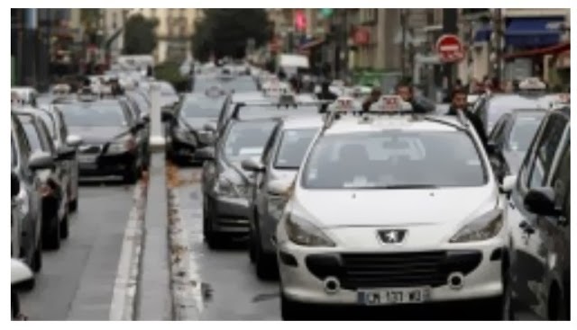 Paris Taxi Trade Show London How It’s Done: More than 5000 taxis ready to block Paris today.